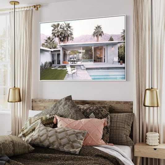 Summer In Palms mid-century poolside home and palms wall art framed above a bed