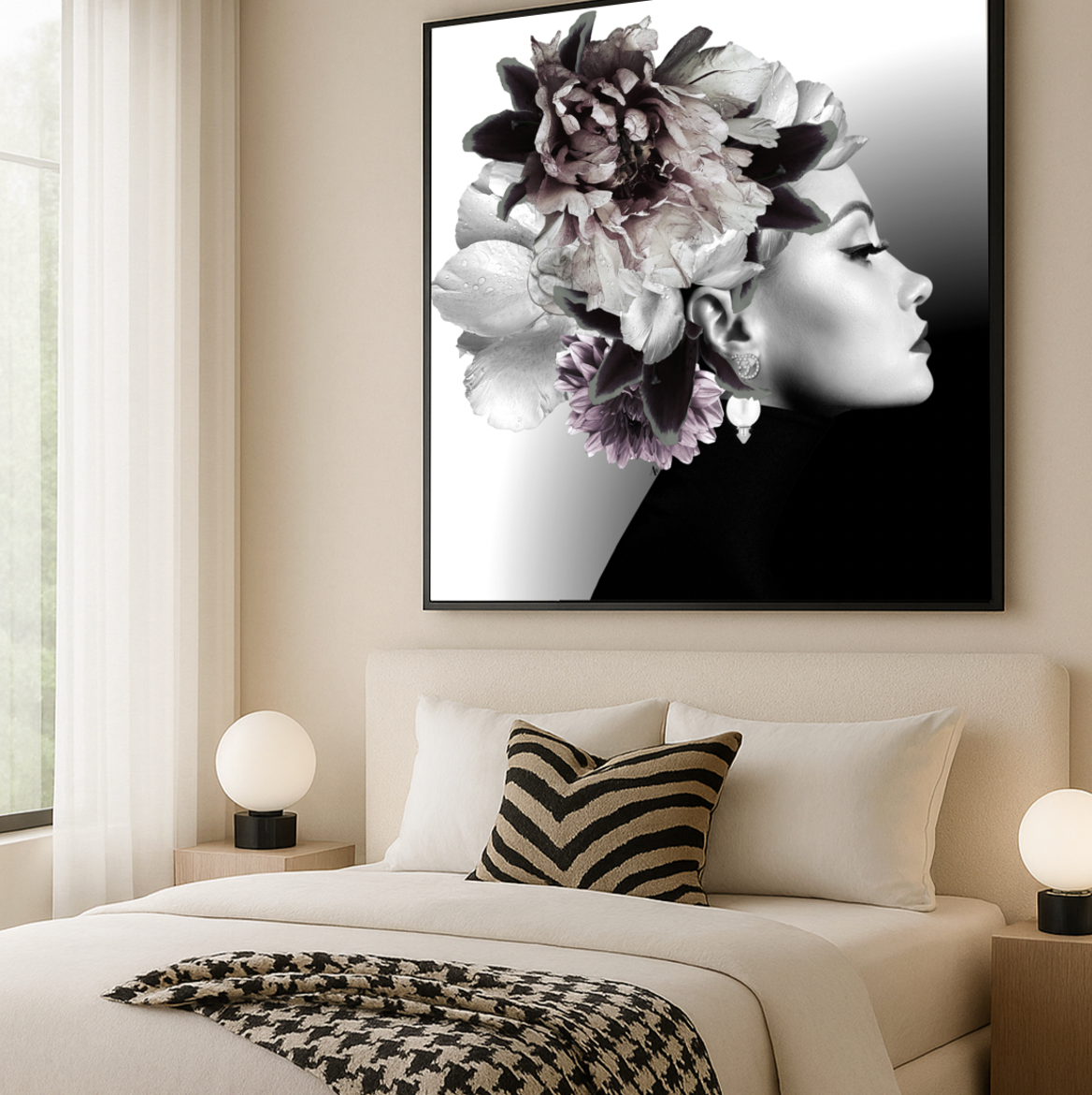 Queen G black and white profile portrait crowned with flowers framed above a bed