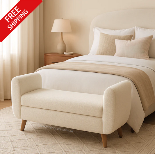 Cloud Storage Bench featuring soft white boucle upholstery, plush rounded form, hidden internal storage, and sculptural design – modern accent furniture by Interior Ave