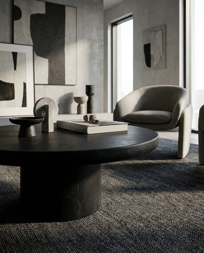 Nobu Round Sculptural Stone Coffee Table in Black | Modern Coffee Table by Interior Ave