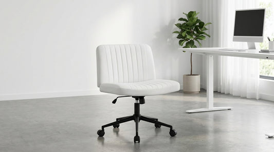 White office chair in a minimalistic office setting with a desk and plant.