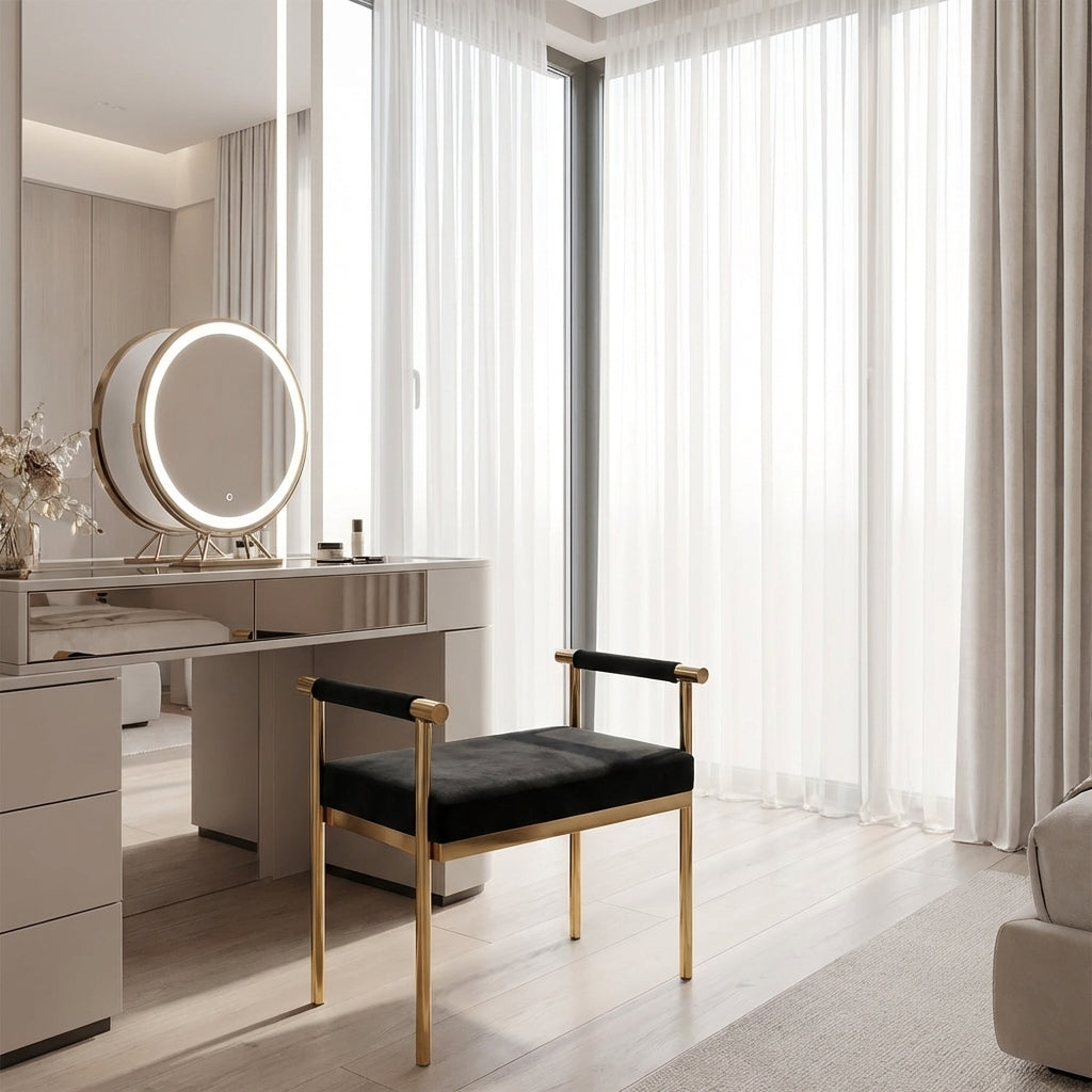 Modern vanity setup with a round mirror and bench in a bright room.