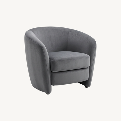 Marlowe accent chair in ocean blue fabric, curved rounded backrest and arms with slim black metal legs