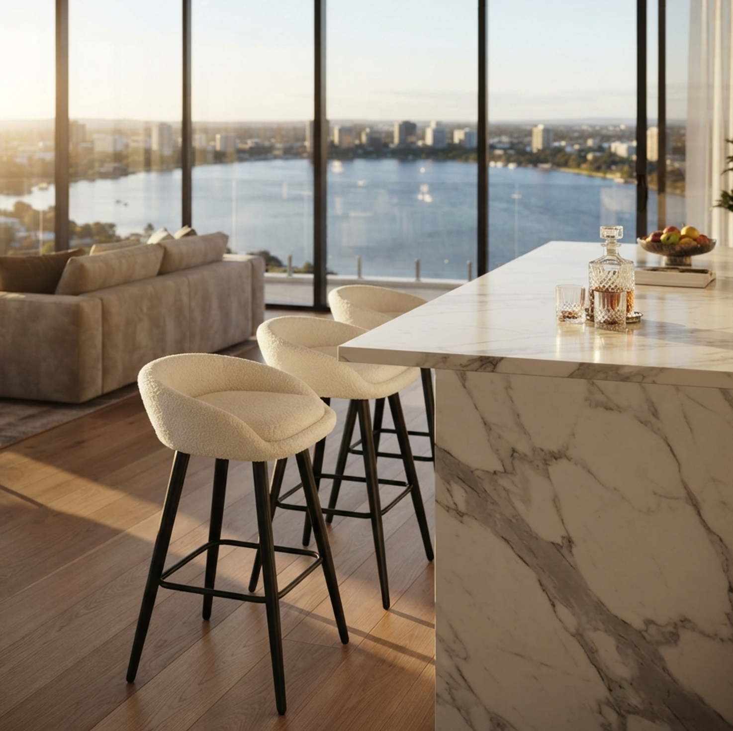 Brosa white boucle bar stool set of two styled at a marble kitchen island with floor-to-ceiling windows and city river views, curved padded seat with slim black metal legs
