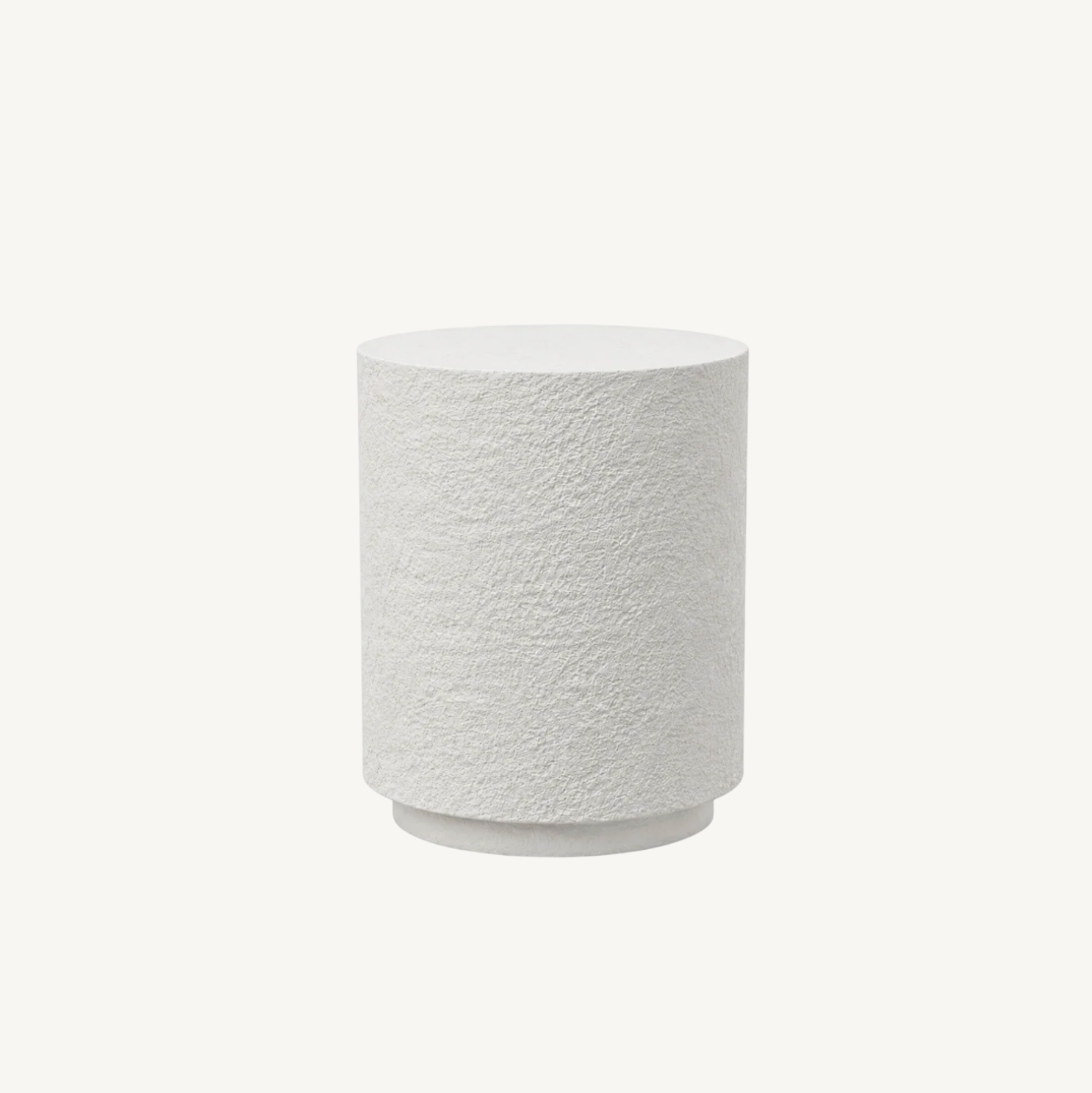 Muse fossil textured side table, white background product shot showing cylindrical form with organic fossil stone finish