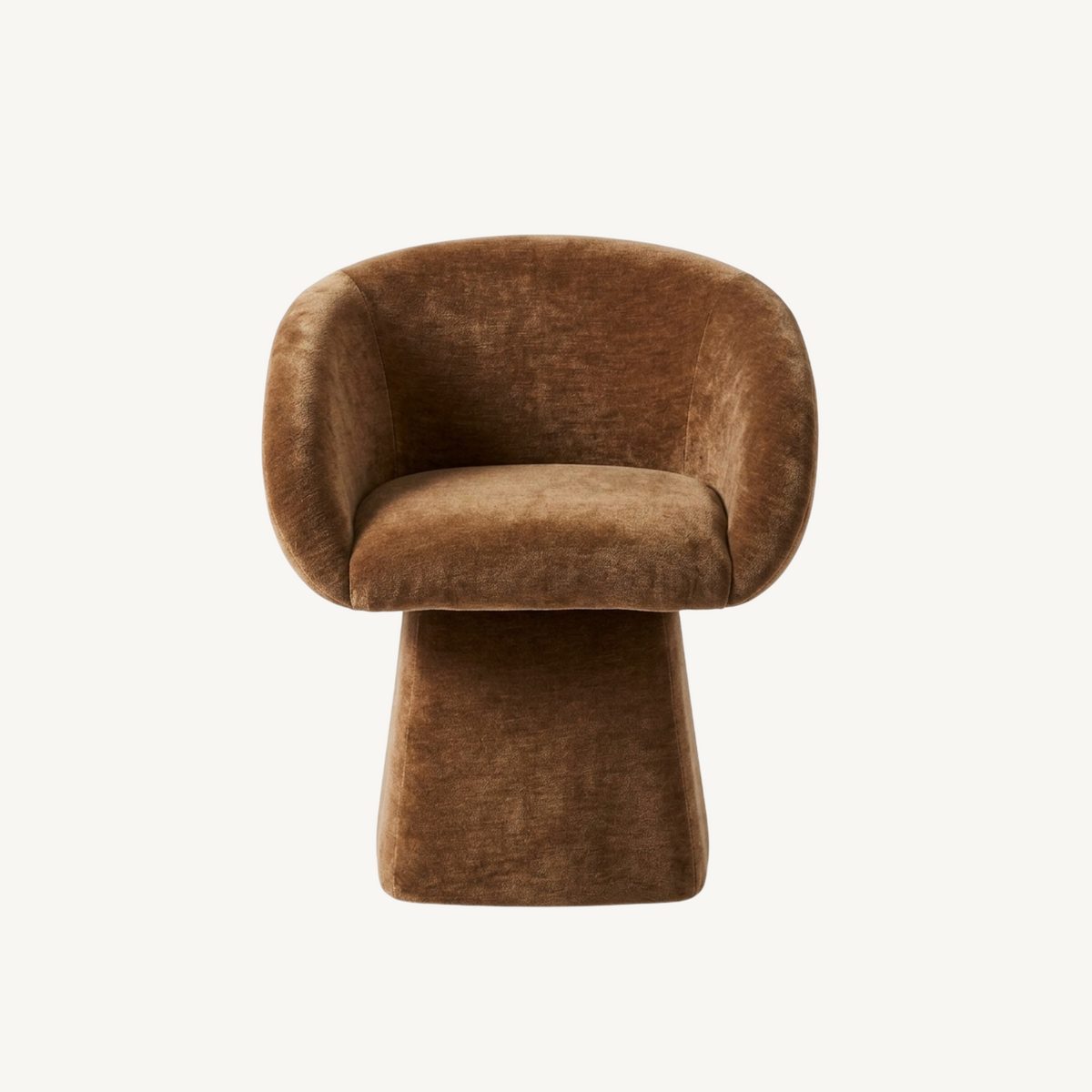 Merlo swivel chair in cinnamon, sculptural curved form with ribbed upholstery and pedestal base styled in a warm bedroom setting