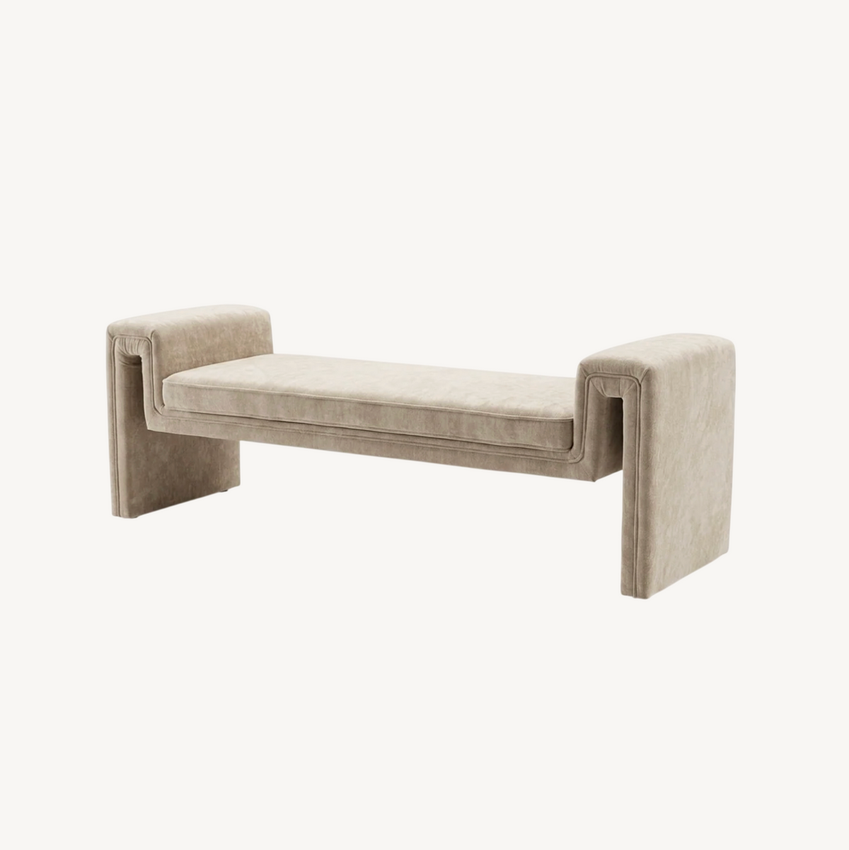 Solace textured bench in natural taupe, waterfall silhouette with upholstered arms styled at the end of a bed on a zebra print rug